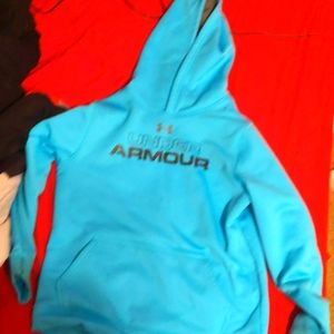 A blue under armor sweater blue